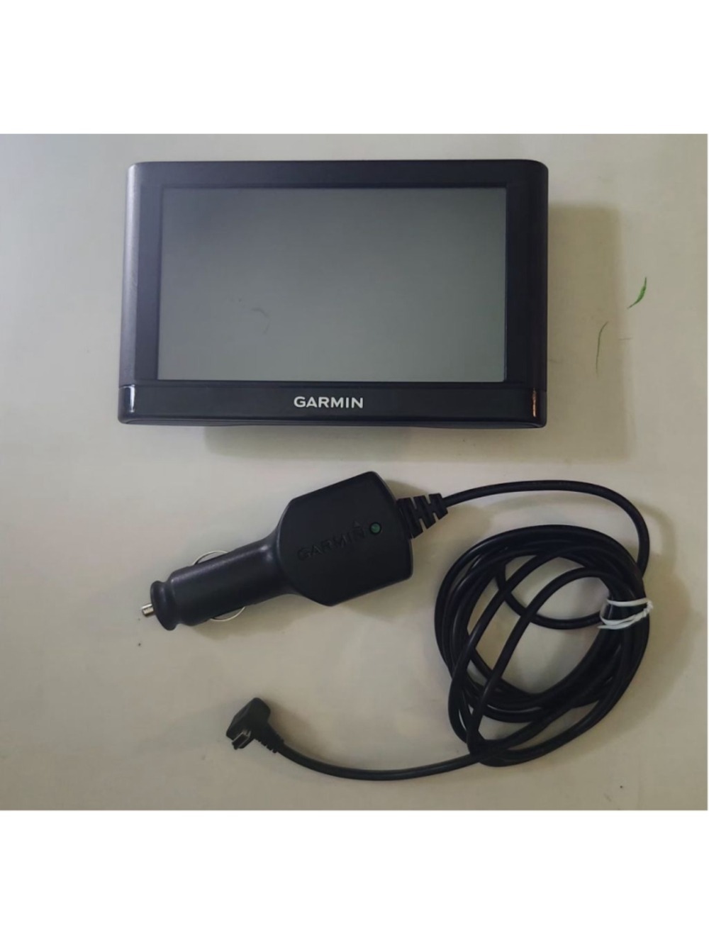 Garmin Nuvi 55LM GPS Navigation System with included Garmin vehicle power charge